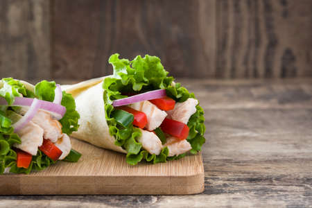 Mexican fajitas on wooden tableの写真素材