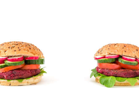 Vegan beetroot burger isolated on white backgroundの写真素材