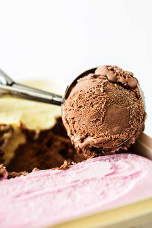 Chocolate ice cream scoop isolated on white backgroundの写真素材