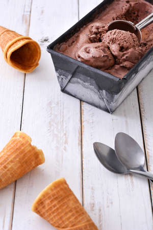 Chocolate ice cream on white wooden backgroundの写真素材