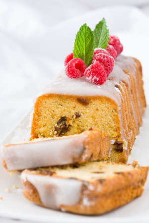 Christmas fruit cake cut on a white sheet