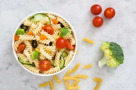 Pasta salad on marble backgroundの写真素材