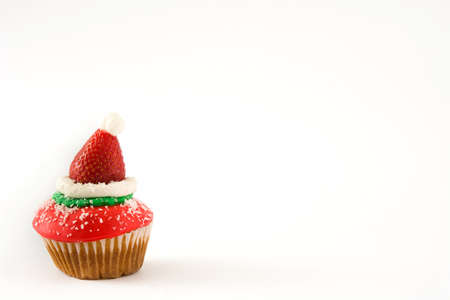 Santa hat cupcake isolated on white backgroundの写真素材