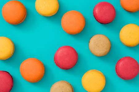 Colored macaroons on blue backgroundの写真素材