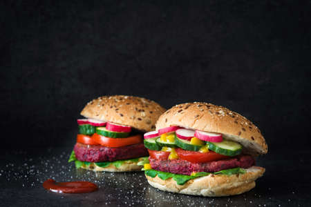 Veggie burger beet on black slate backgroundの写真素材