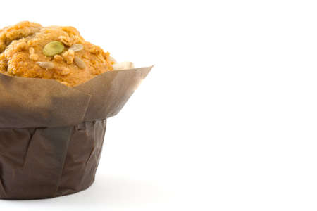 Muffin with nuts isolated on white backgroundの写真素材