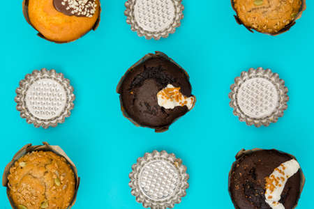 Variety of muffins on blue backgroundの写真素材