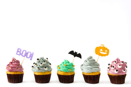 Halloween cupcakes isolated on white backgroundの写真素材