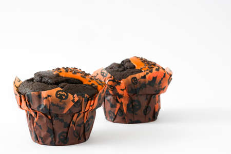 Halloween muffins isolated on white backgroundの写真素材