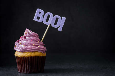 Halloween cupcake on black backgroundの写真素材