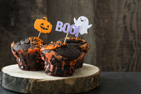 Halloween cupcake on wooden backgroundの写真素材