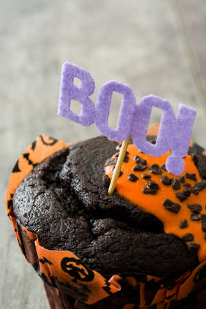 Halloween muffins on a wooden tableの写真素材