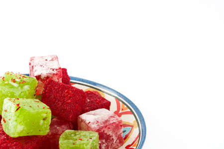 Sweet pieces of turkish delight isolated on white backgroundの写真素材