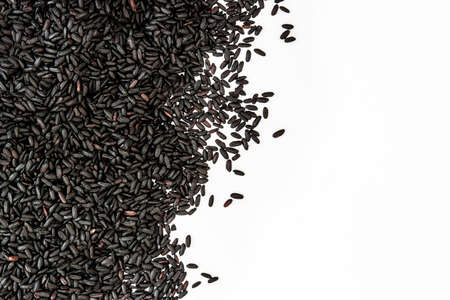 Black rice isolated on white backgroundの写真素材