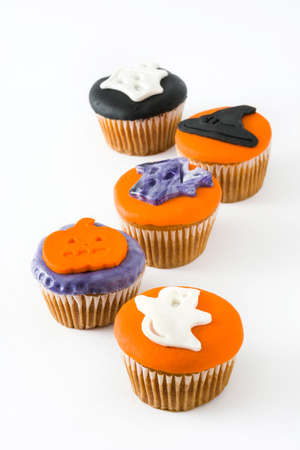 Halloween cupcakes isolated on white backgroundの写真素材