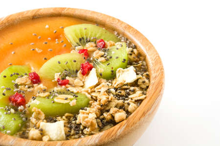 Smoothie with fruit, cereals and chia isolated on white backgroundの写真素材