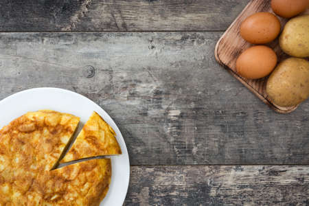 Traditional spanish omelette on wooden tableの写真素材