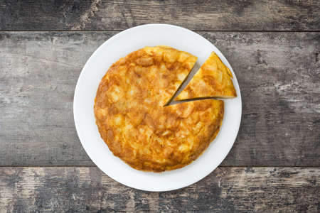 Traditional spanish omelette on wooden tableの写真素材