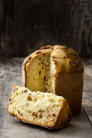 Panettone Christmas cake on wooden backgroundの写真素材
