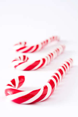 Candy cane isolated on white backgroundの写真素材