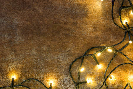 Christmas lights on rusty backgroundの写真素材
