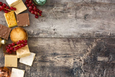 Christmas nougat on wooden background.Copyspaceの写真素材