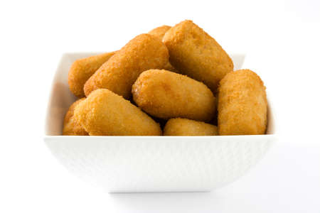 Traditional Spanish fried croquettes isolated on white background