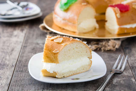 Spanish typical epiphany cake "Epiphany Cake", on wooden backgroundの写真素材