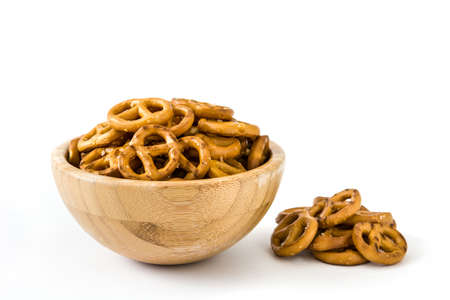 Pretzels in bowl isolated on white background.copyspaceの写真素材