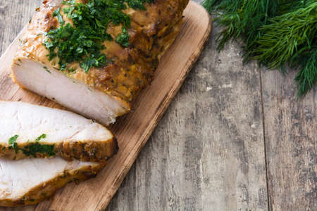 Roasted pork on wooden tableの写真素材