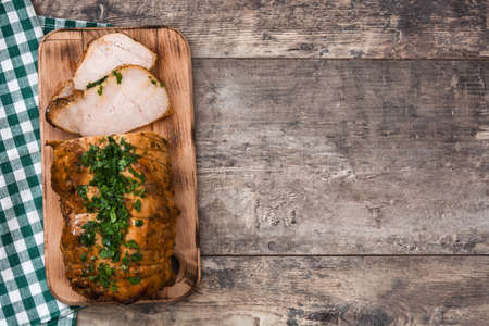 Roasted pork on wooden tableの写真素材