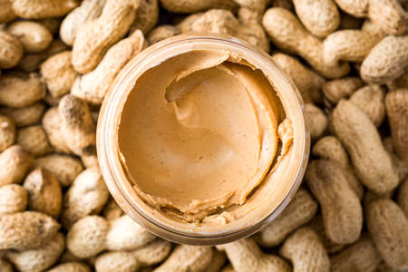 Creamy peanut butter on peanut background.Overviewの写真素材