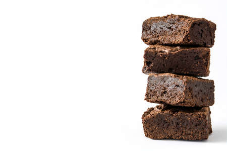 Chocolate brownie pieces isolated on white backgroundの写真素材