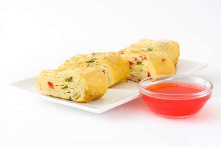 Tamagoyaki Traditional Japanese omelette isolated on white backgroundの写真素材