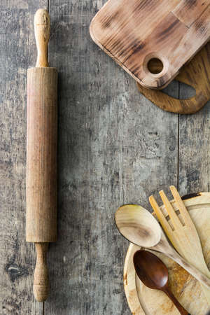 Wooden cooking utensils on wooden backgroundの写真素材