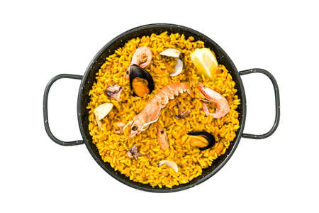Traditional Spanish seafood paella, isolated on white backgroundの写真素材