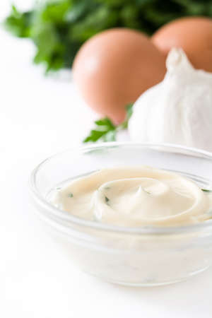 Aioli sauce and ingredients isolated on white backgroundの写真素材