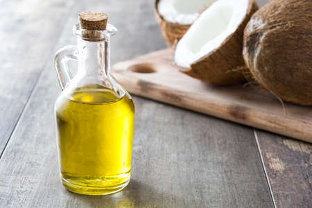 Coconut oil on wooden backgroundの写真素材