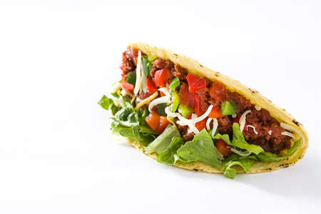 Traditional Mexican taco with meat and vegetables, isolated on white backgroundの写真素材