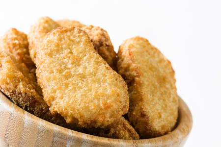 Fried chicken nuggets in bowl isolated on white backgroundの写真素材