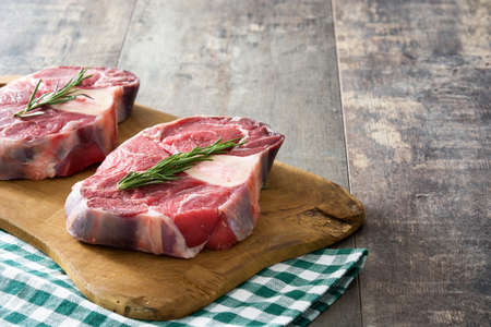 Raw meat on wooden backgroundの写真素材