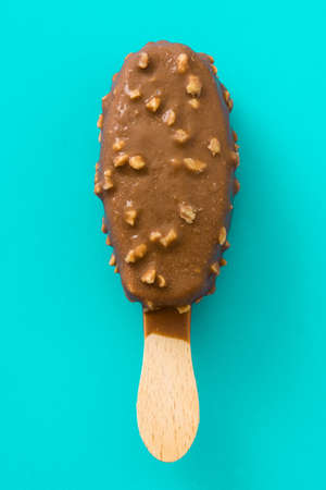 Black chocolate ice cream  on blue background.