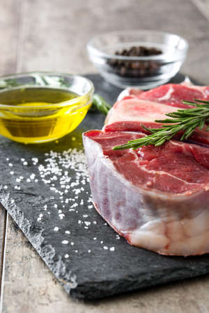 Raw meat on wooden backgroundの写真素材