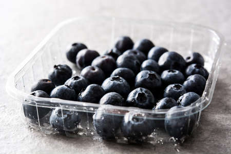 Blueberries on gray stoneの写真素材