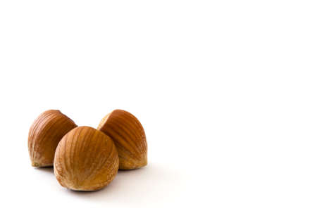Hazelnuts isolated on white backgroundの写真素材