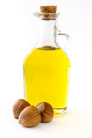 Hazelnuts oil isolated on white backgroundの写真素材