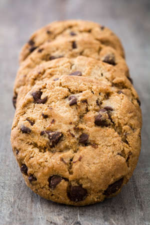 Chocolate chip cookies on wooden table backgroundの写真素材