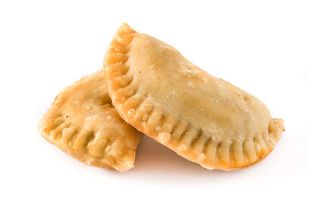 Typical Spanish empanadas isolated on white background