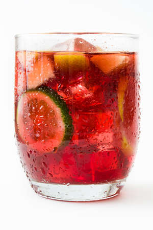 Sangria drink in glass isolated on white backgroundの写真素材
