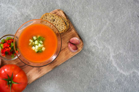 Traditional Spanish cold gazpacho soup on gray stone.の写真素材